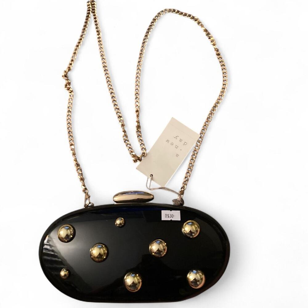 Black clutch with gold studs